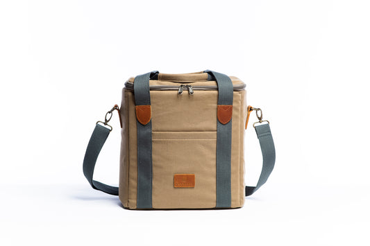 Front on image of the Slowlife Collection Olive Cooler Bag. This has a front pocket, leather detailing and a long shoulder strap included.