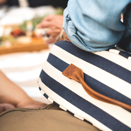 the navy and cream striped Slowlife Collection cushion