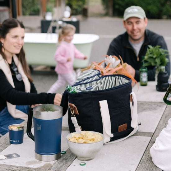 Black and white insulated picnic bag for outdoor meals