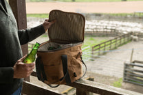  brown bag with a bottle