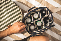  striped cooler bag with beer cans 