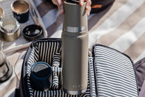 silver thermos labeled Slowlife