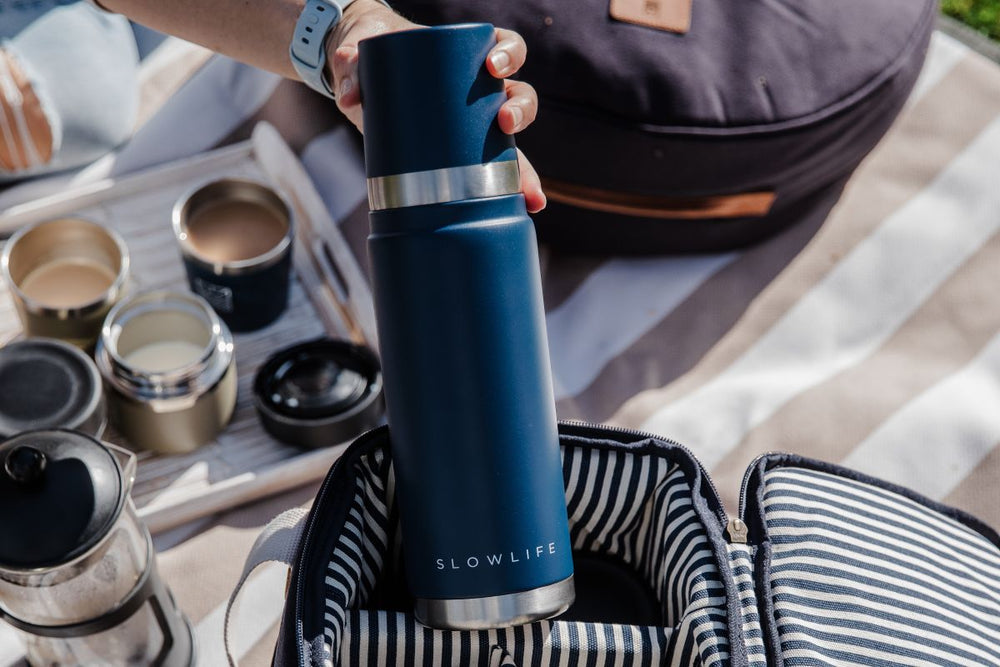 Blue thermos with 'Slowlife' branding