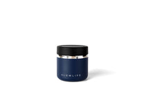 Navy blue container with black lid