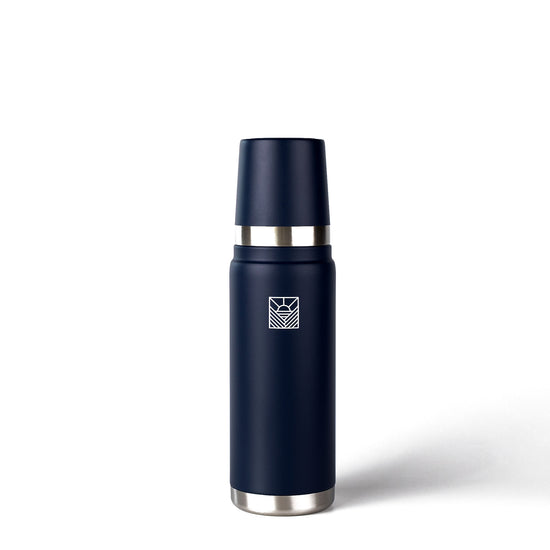 Navy blue thermos with silver base