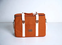 Terracotta Picnic bag with white straps on a white background