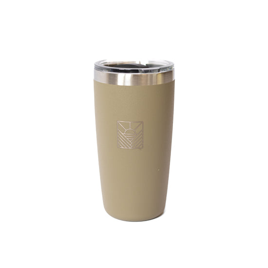 Beige tumbler with a silver rim