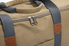A close up of the Slowlife Collection Olive Picnic Bag. It shows detailing of the grey straps and YKK zips.